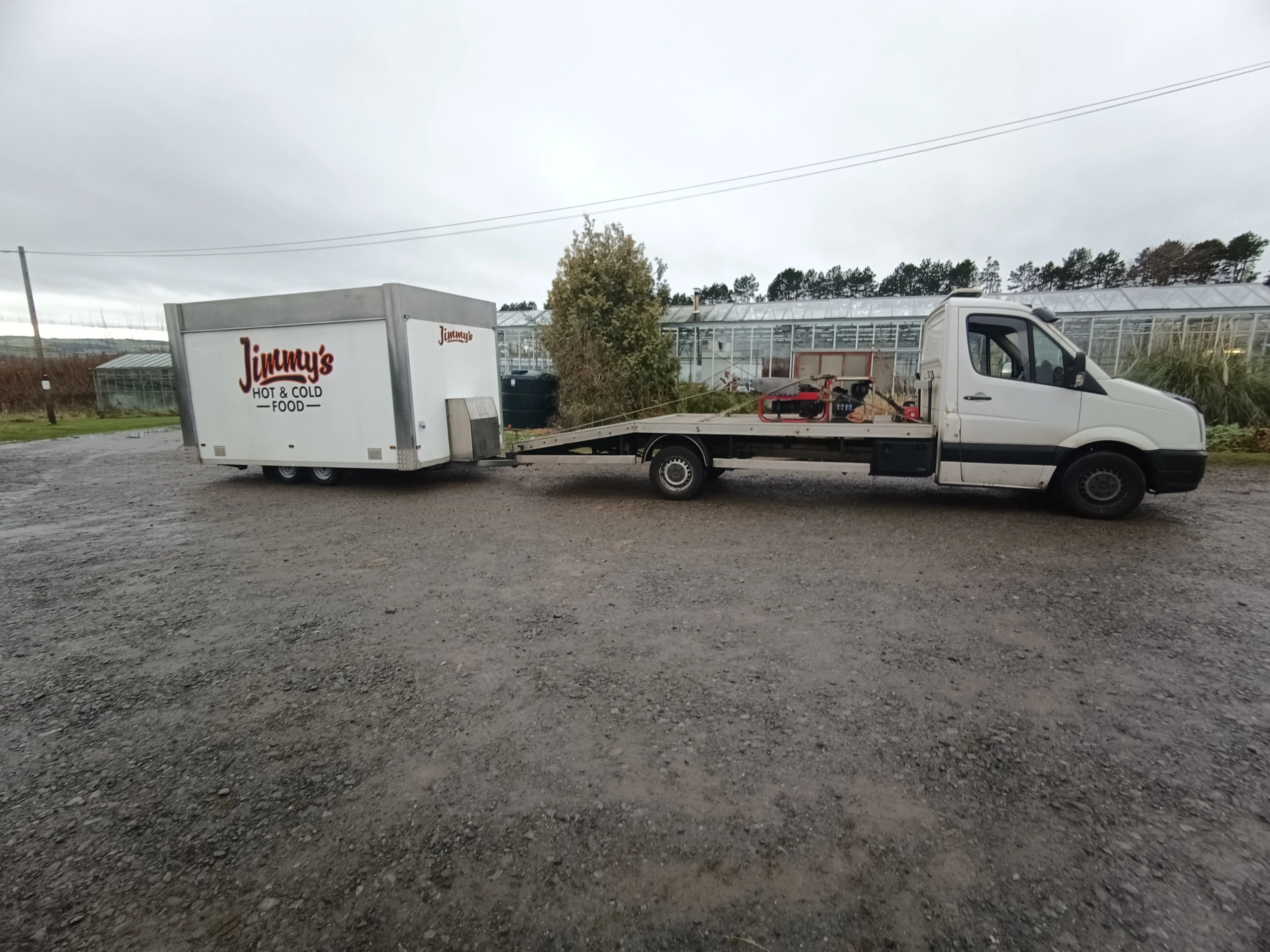 Recovery truck towing a trailer cabin for RV and trailer recovery