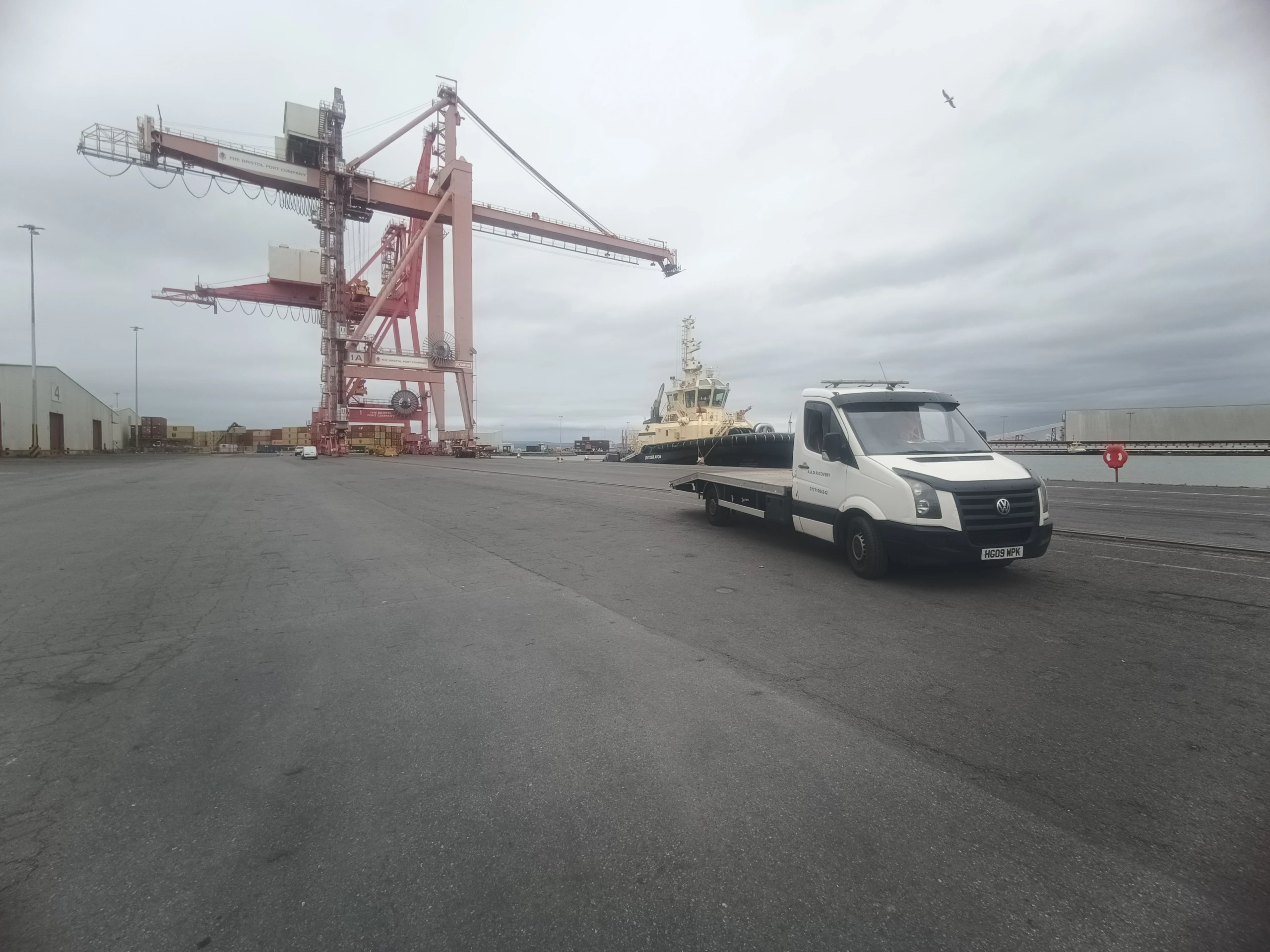 AAD recovery truck at a port during long-distance vehicle transport